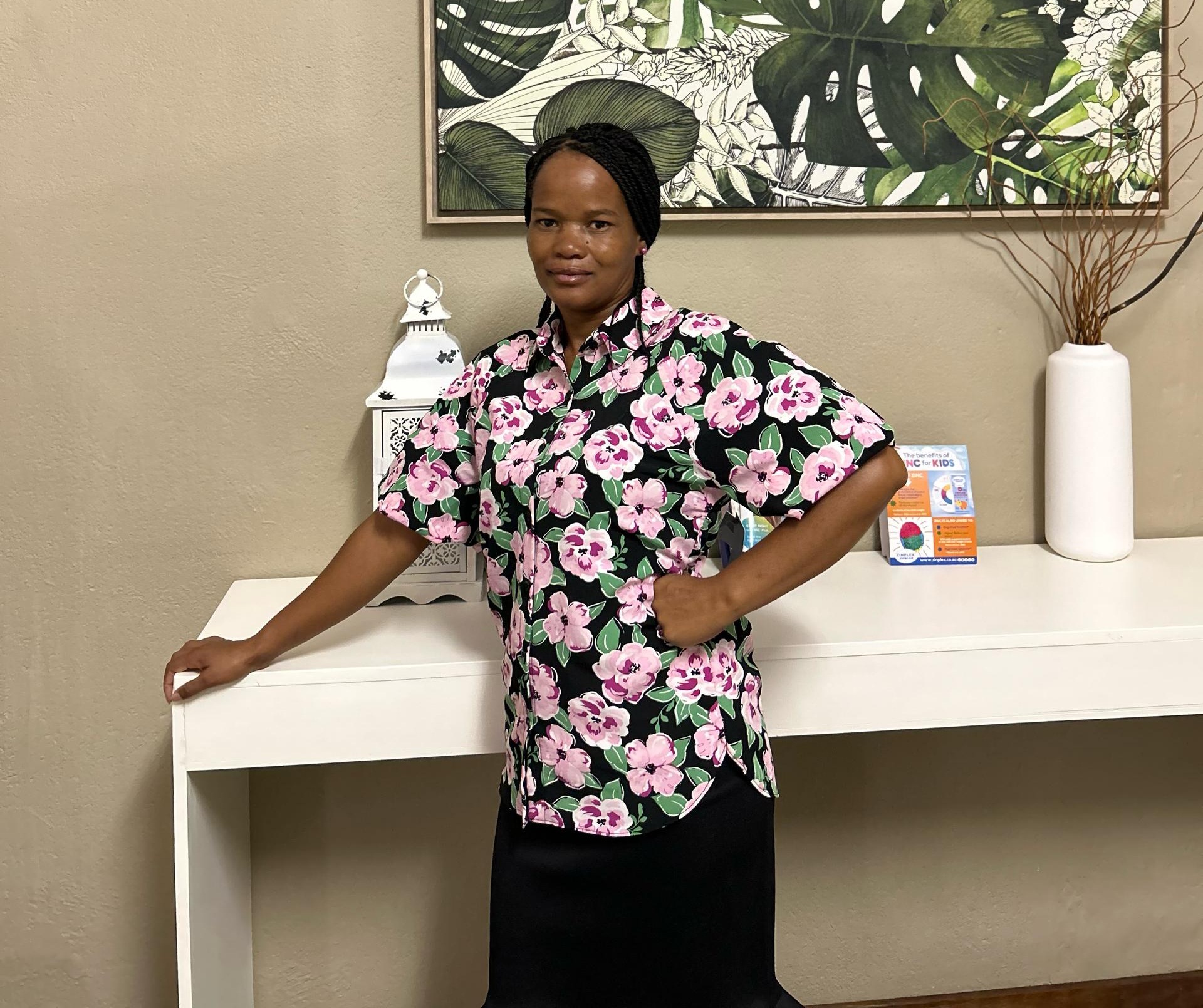 Staff member at reception area